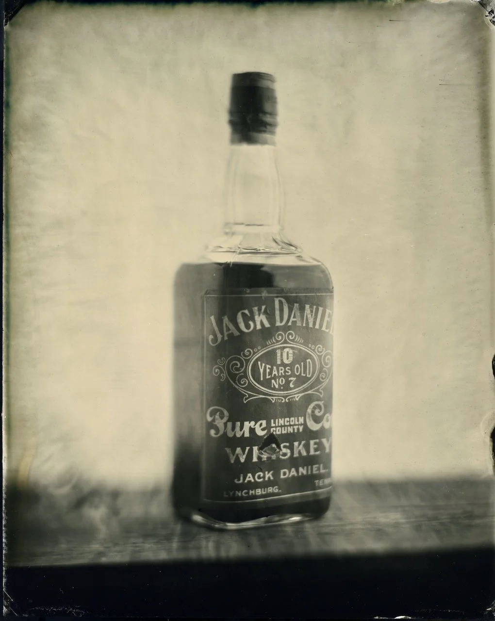 Tintype photograph of an archival Jack Daniel’s Ten Year Old whiskey bottle created by Nashville tintype photographer Blake Wylie.