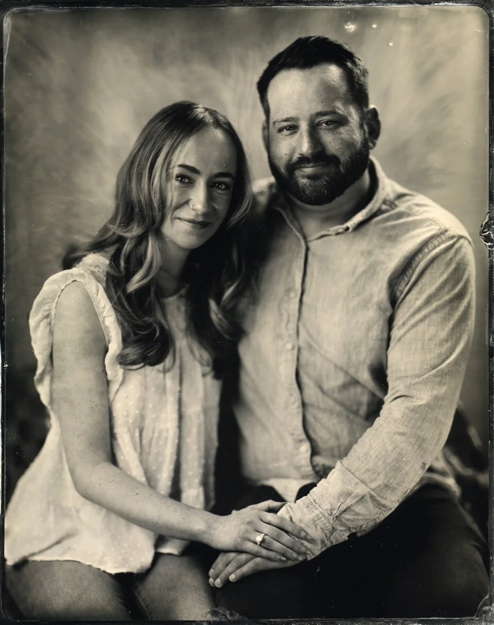 Tintype portrait of a couple holding hands during a studio session in Franklin, Tennessee