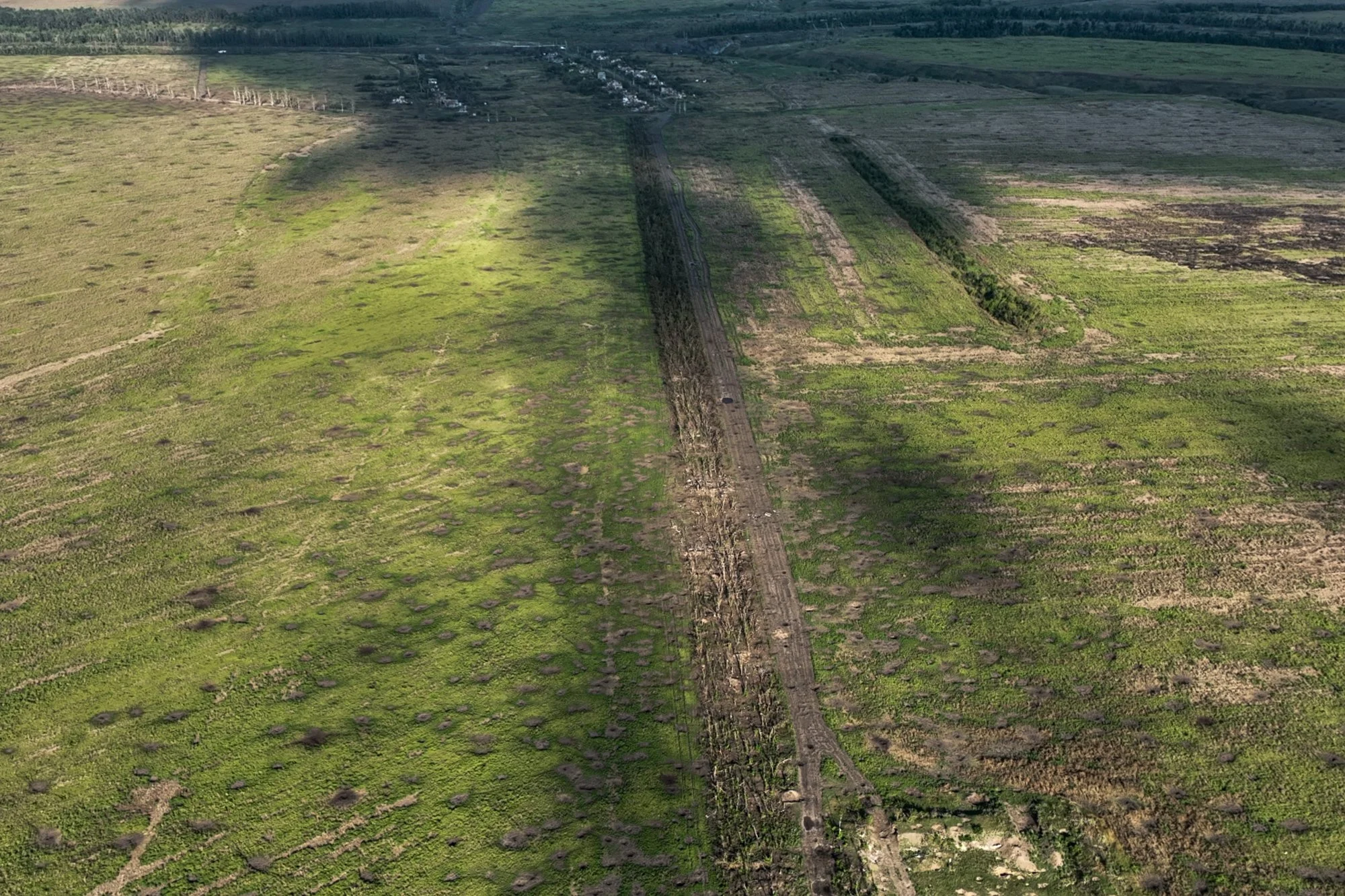  This stretch of dead forest — a couple dozen trees wide and a mile (2 kilometers) long — toward the equally dead village of Andriivka is one of countless like it on the road to Russian-controlled Bakhmut, which has now taken on huge symbolic signifi