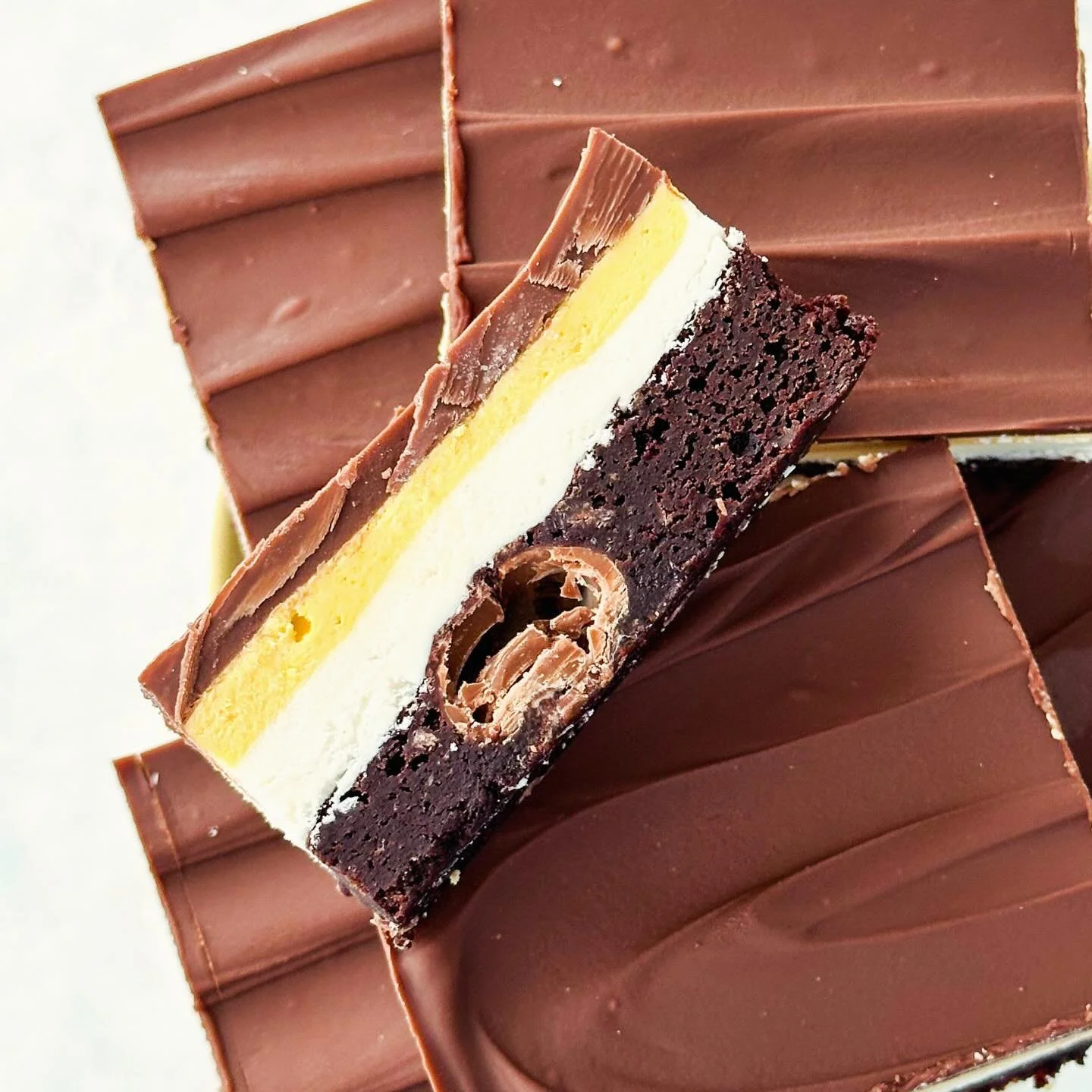 &bull; o u t r a g e o u s &bull;

The most decadent brownie of all time!  A total showstopper with 4 gorgeous layers, and top quality belgian chocolate.

It&rsquo;s the perfect treat for Easter.

Orders are still open (website linked in my profile)