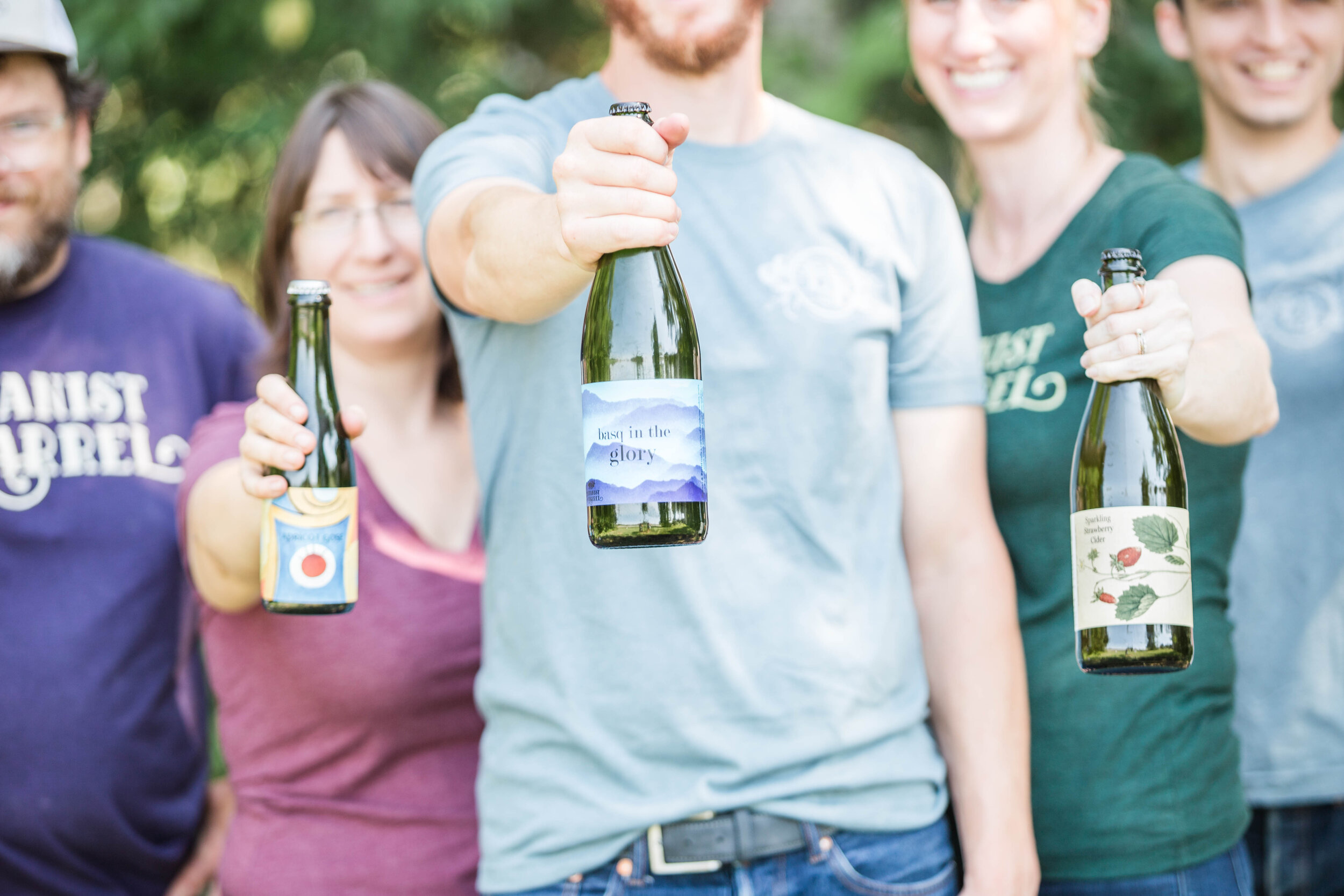 Crew holding Bottles Credit: Brooks Bennett