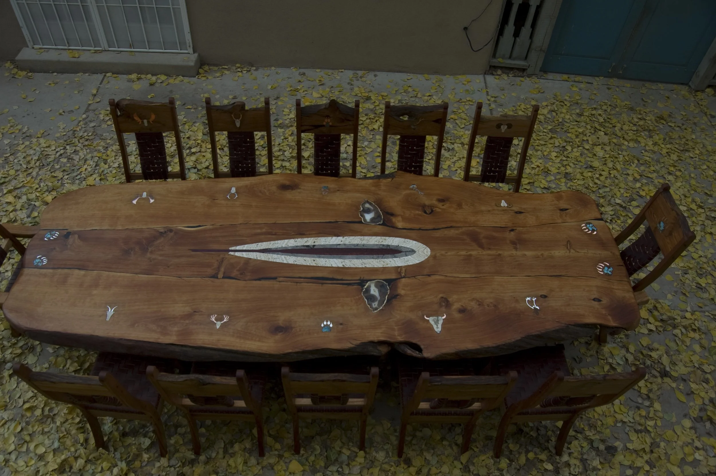 Table with inlays of north American game