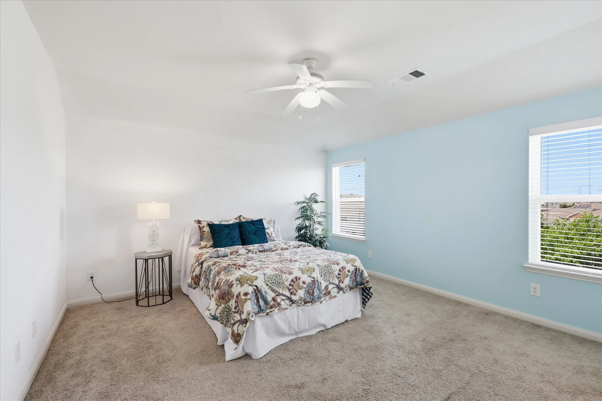 Primary bedroom is large enough for a king sized bed