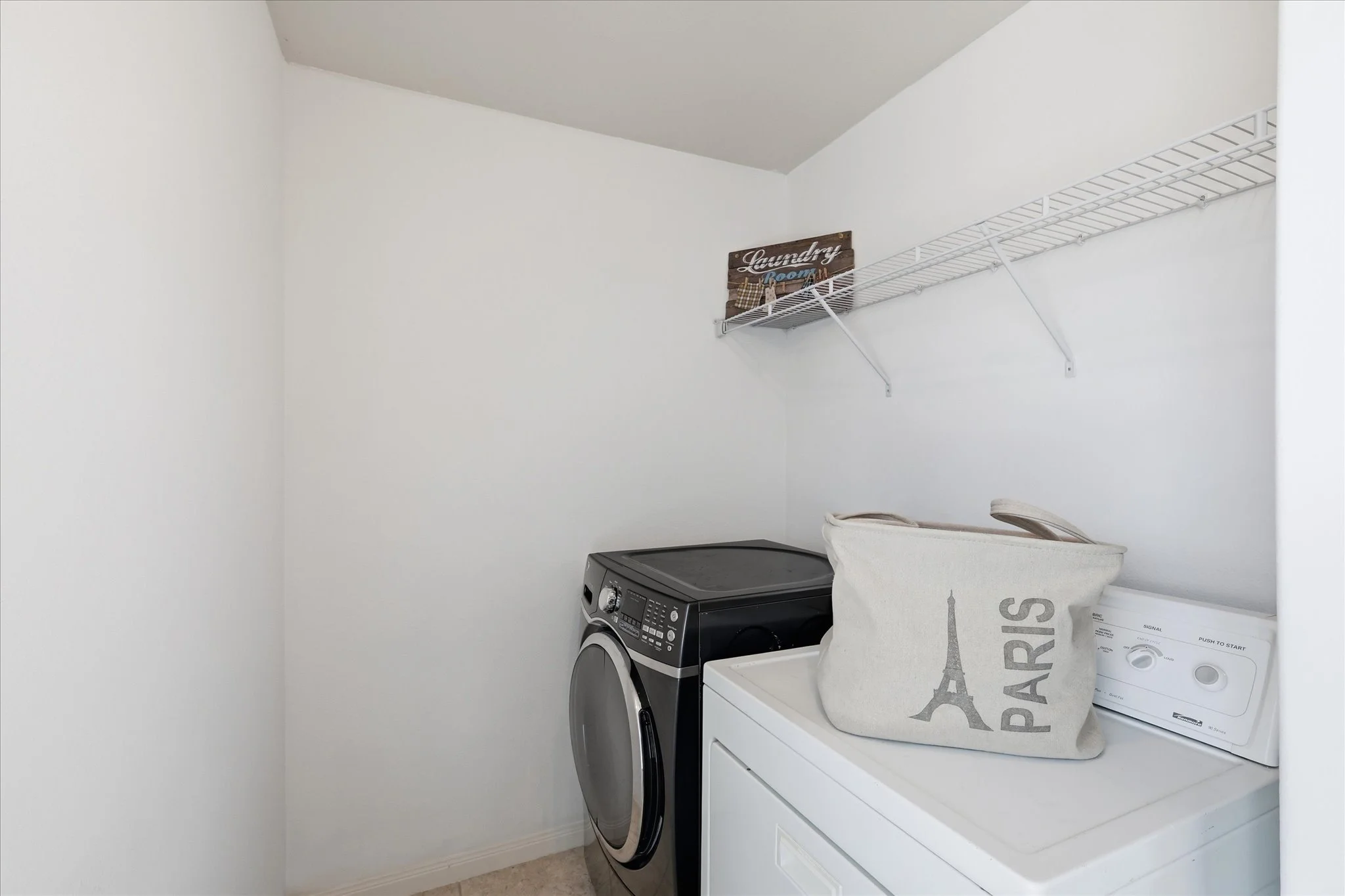 Laundry room with lots of storage and hanging space