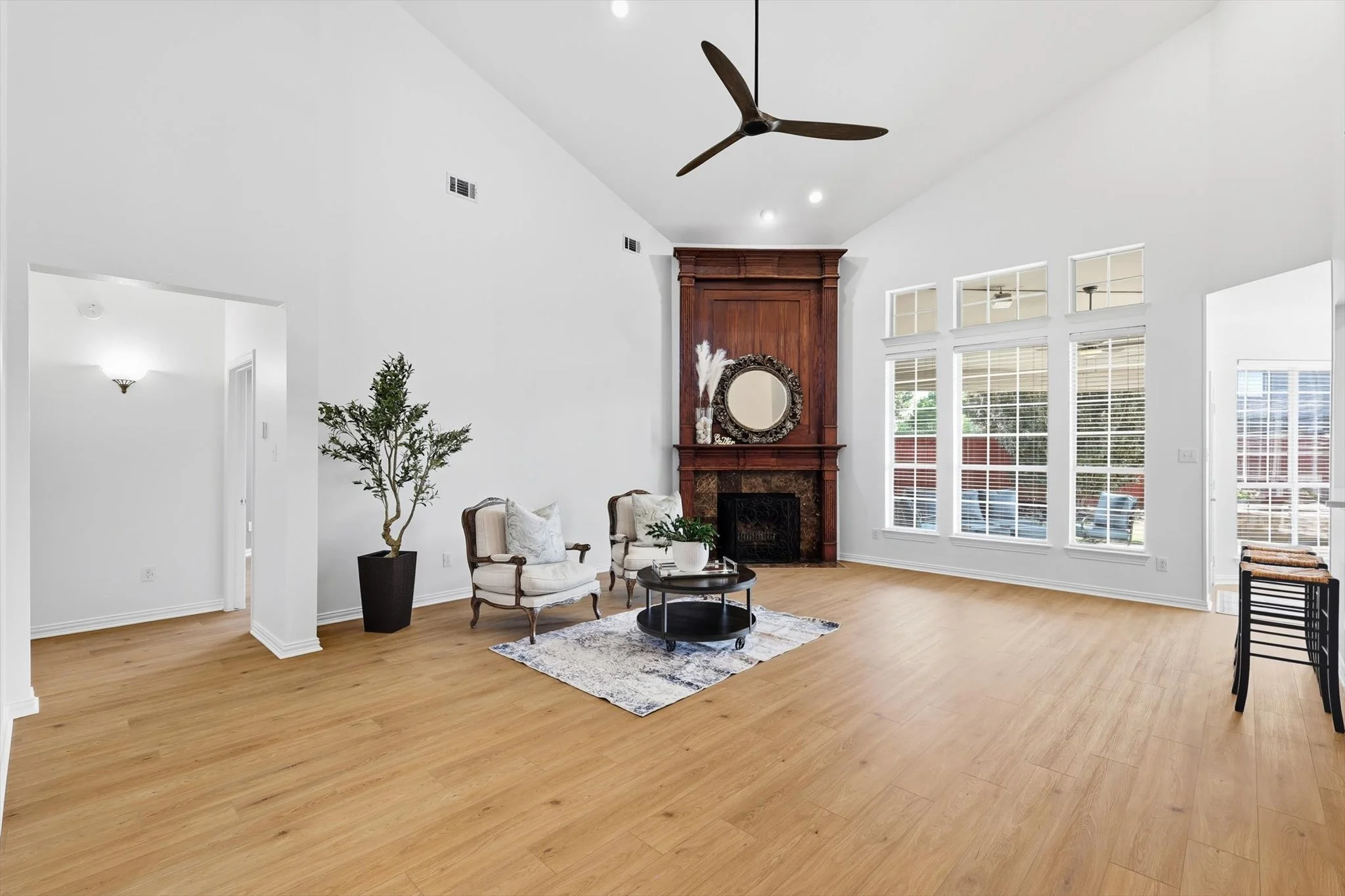 Expansive family room with vaulted story ceilings