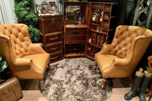 Whiskey Stateroom Trunk Tasting Station w/ Tan Grandfather Chairs