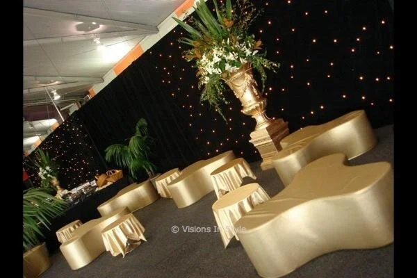 Club Shaped Gold Ottomans