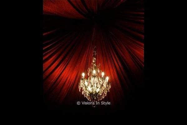 Chandelier and Red Silk Roof Lining