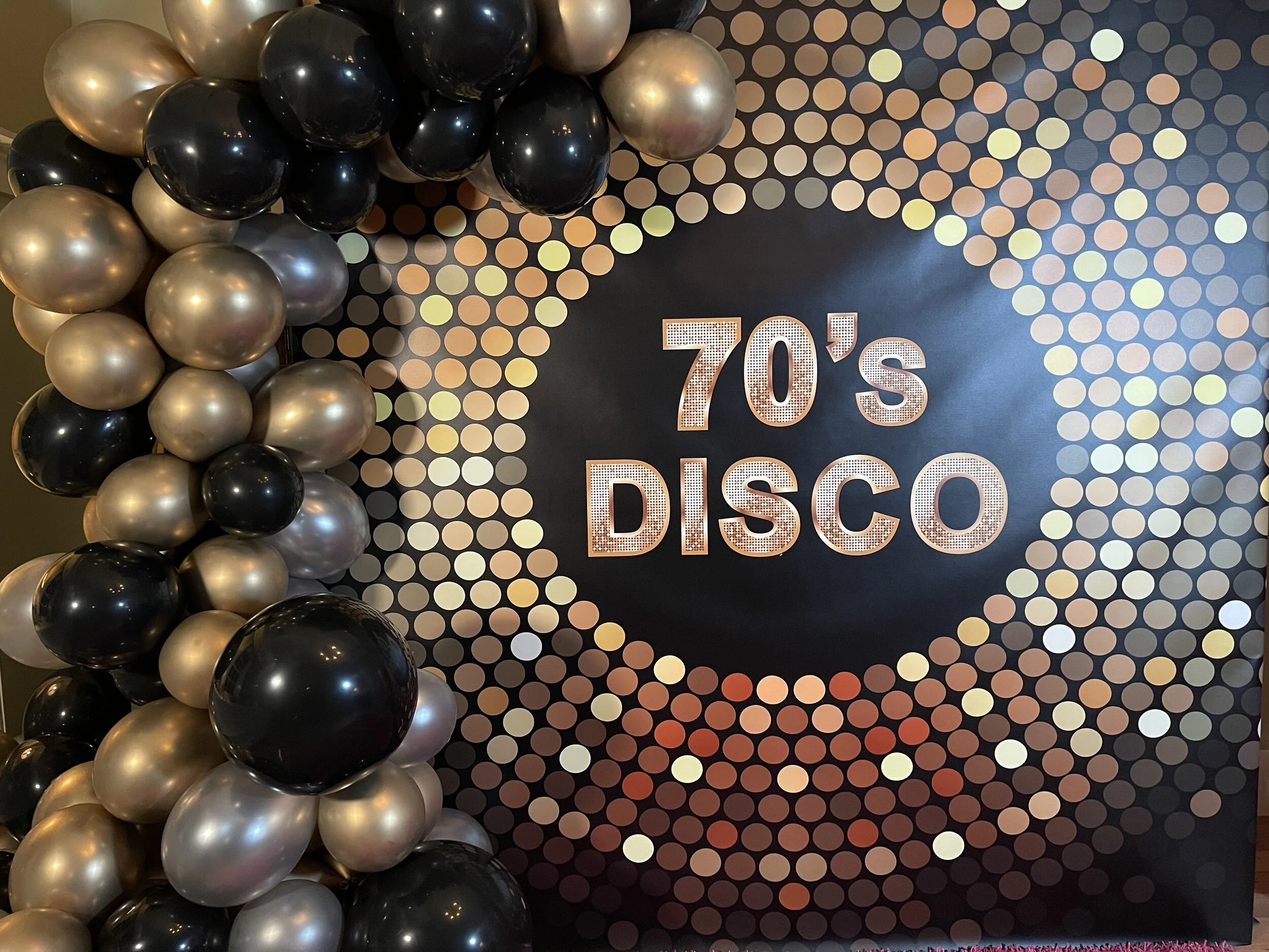 Seventies photo area with balloons.jpeg