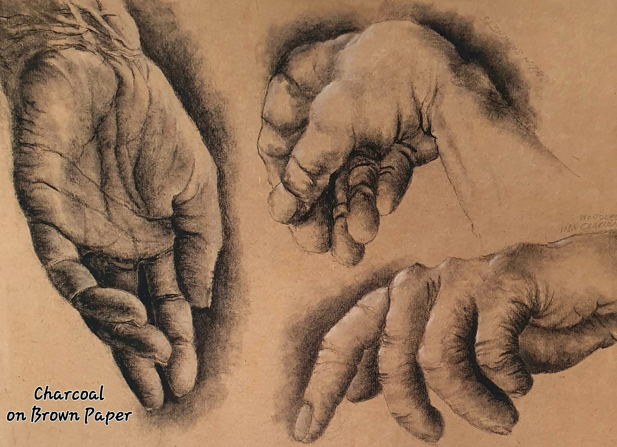 Hands charcoal on brown Kraft.jpg