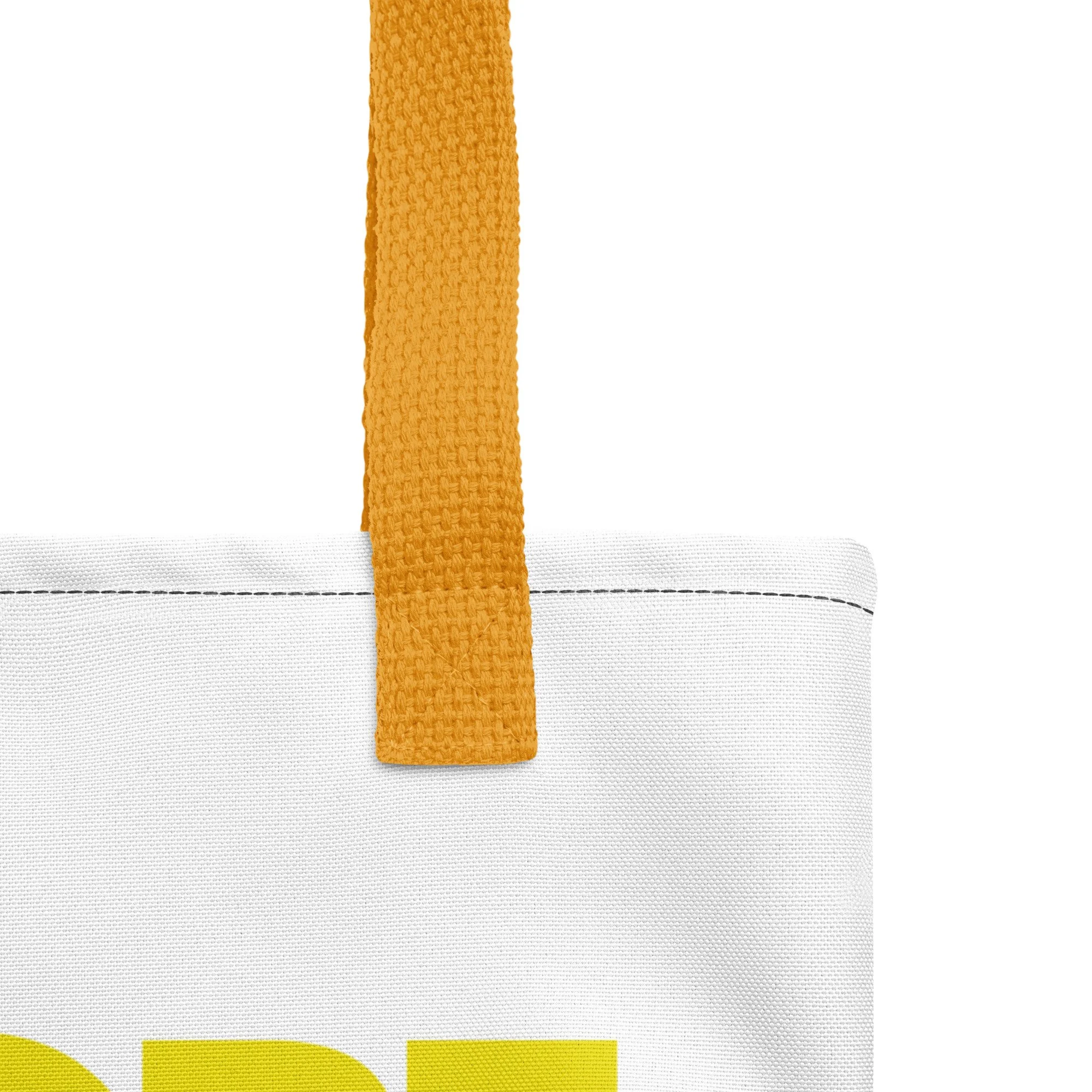 all-over-print-tote-bag-yellow-15x15-product-details-6862964fd6be3.jpg