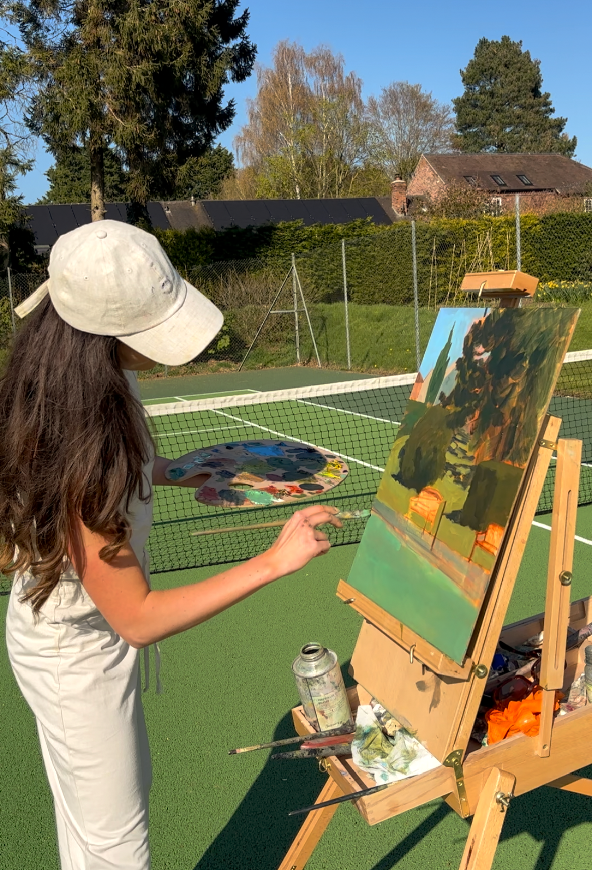 Painted en plein air at Ellerton Hall in Shropshire, the original oil painting captures the timeless elegance of the estate's private grass tennis court bathed in warm summer light.