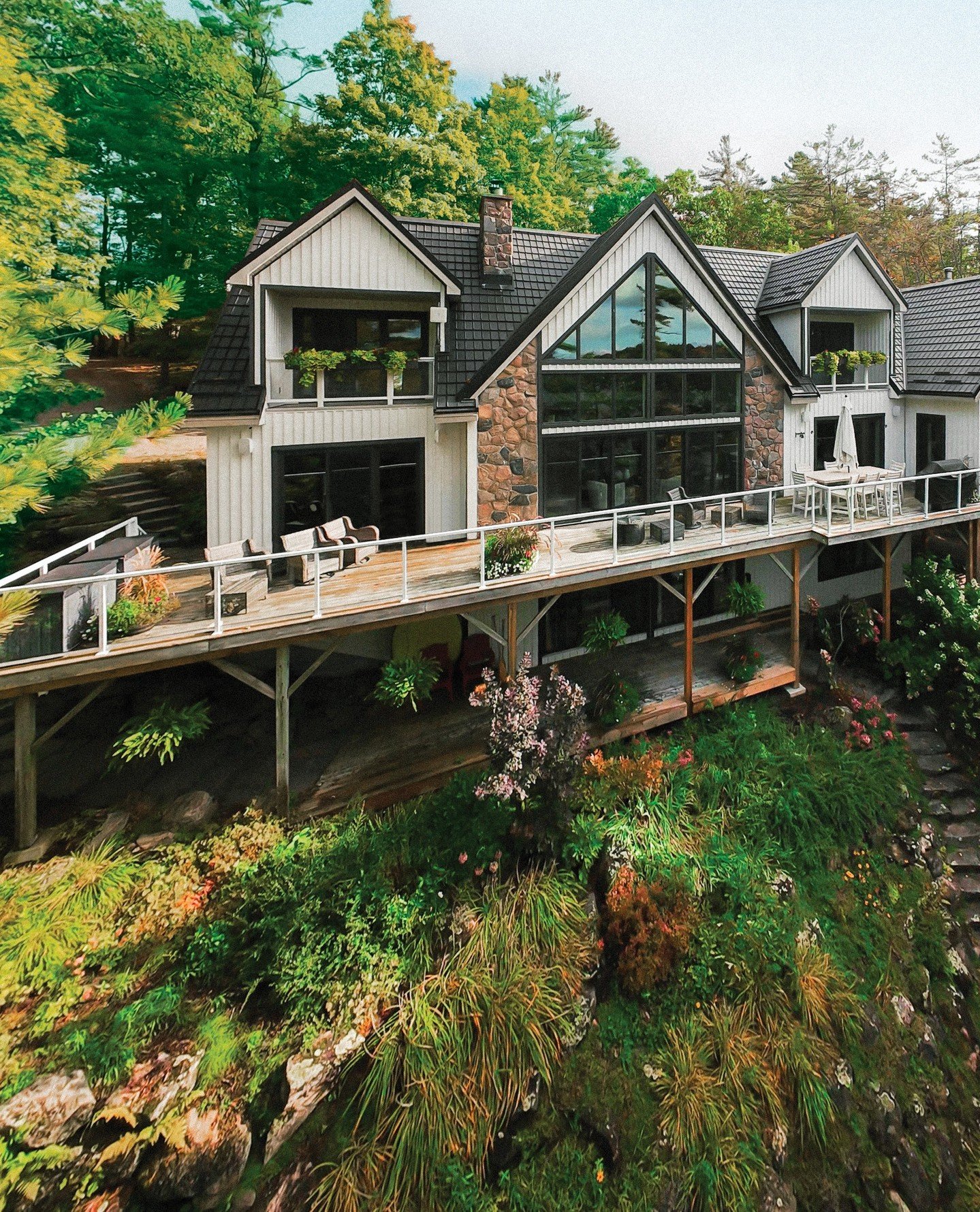 Every detail has been thoughtfully considered in this serene cottage retreat, perfectly positioned steps from Lake Muskoka and deeply connected to the surrounding environment. A true private paradise, where sweeping views of the lake unfold from near