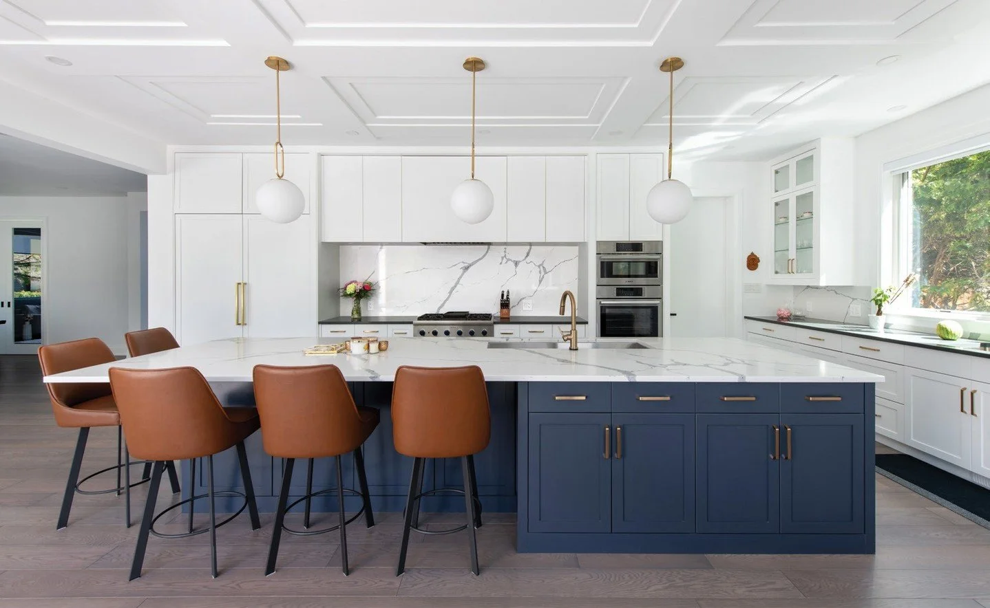 The attention to detail in this Alta Vista home is gorgeous, including a tray ceiling in the kitchen that is a subtle yet impactful design statement. By including a sun-filled eat-in kitchen table with built-in banquette seating, it has become a favo
