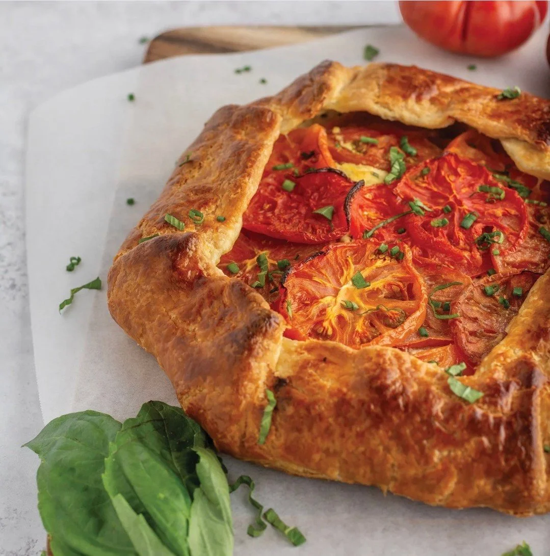 This heirloom Tomato &amp; Ricotta Galette is a must-try recipe!🍅⁠
⁠
A rustic galette of handmade pastry layered with ricotta, chives and basil, topped with heirloom tomatoes. Baked until golden, it combines creamy cheese, fresh herbs and the natura