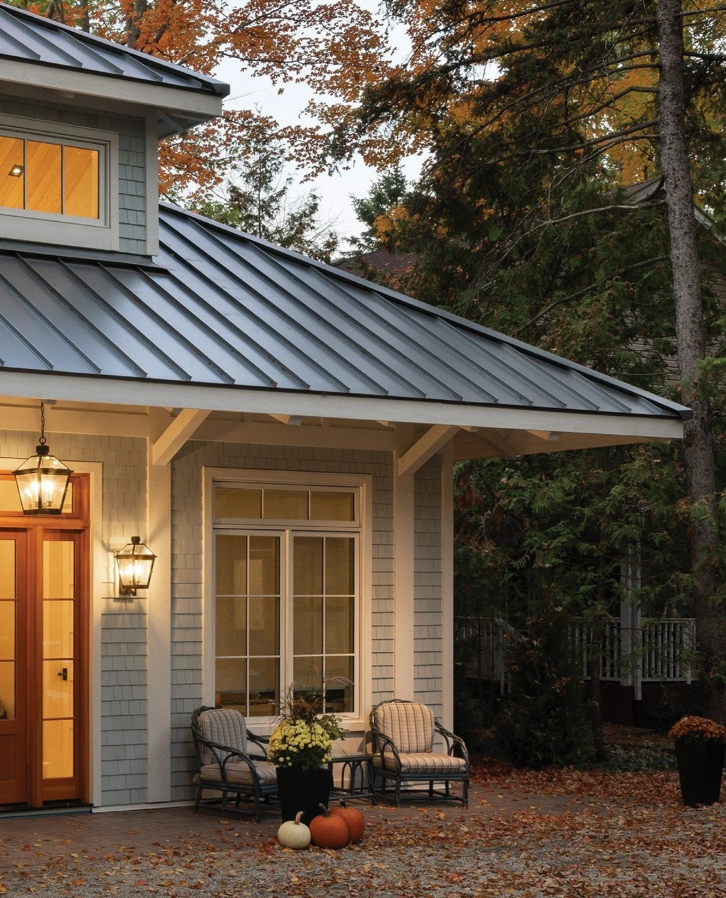 As we turn the calendar to September, this Wahnekewaning Beach home elegantly captures the changing of the season and it was reconstructed to cherish a family legacy. The exterior is beach-glass blue and built with a combination of panels, beam work,