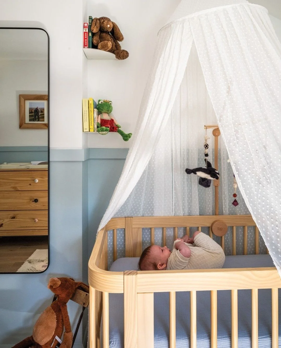With Mom as an Interior Designer, this little one is growing up in a beautiful home with a handsome bedroom, including his crib that will convert into a toddler bed, keeping the nature design in this room the same for many years.  A vintage find, the