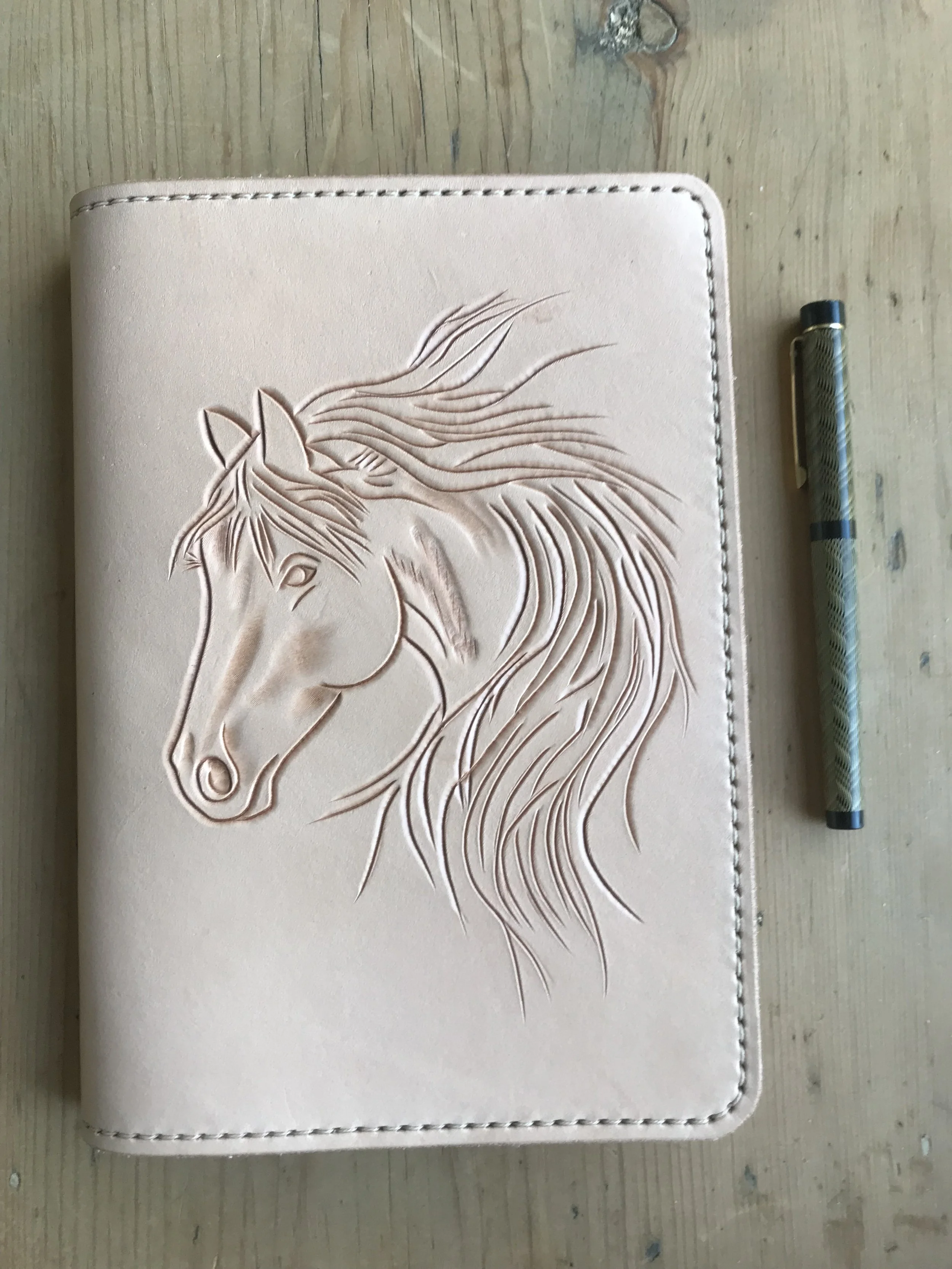 A5 Leather journal slipcover: Natural leather with horse with flying mane.