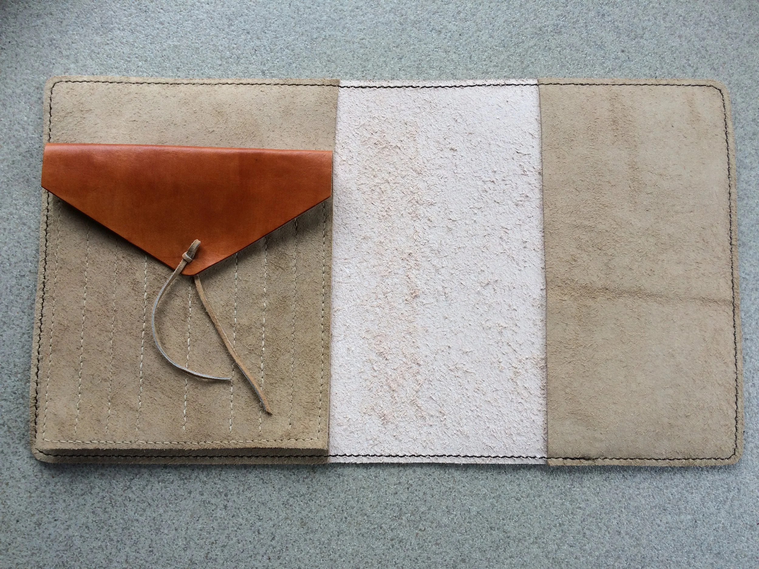 Personalised A4plus sized leather document wallet with bespoke cover and  customised interior pockets.