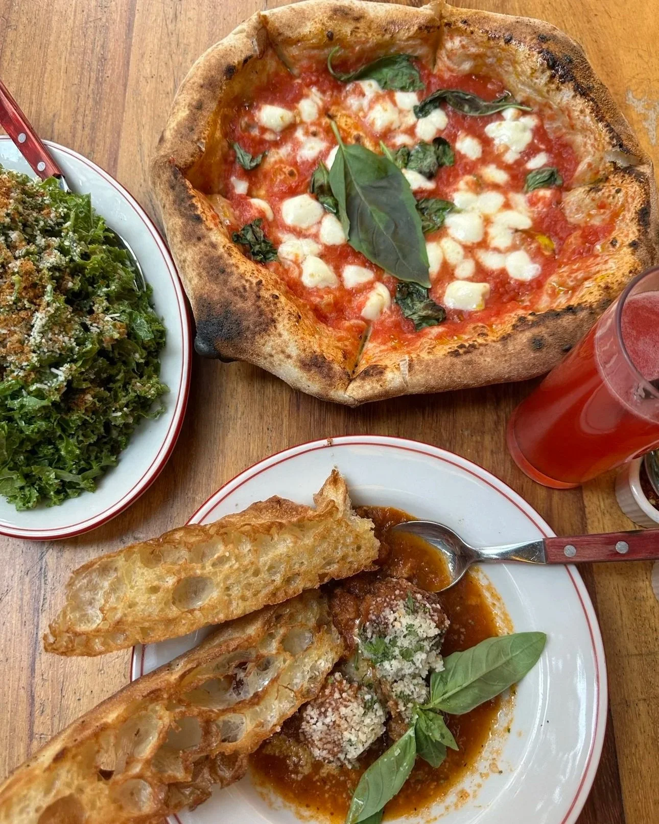 Pizza Felix, Roma Norte Mexico City kale caesar salad, meatballs, margherita pizza