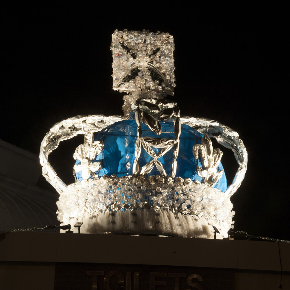 Floodlit and glittering, the Crown at night.