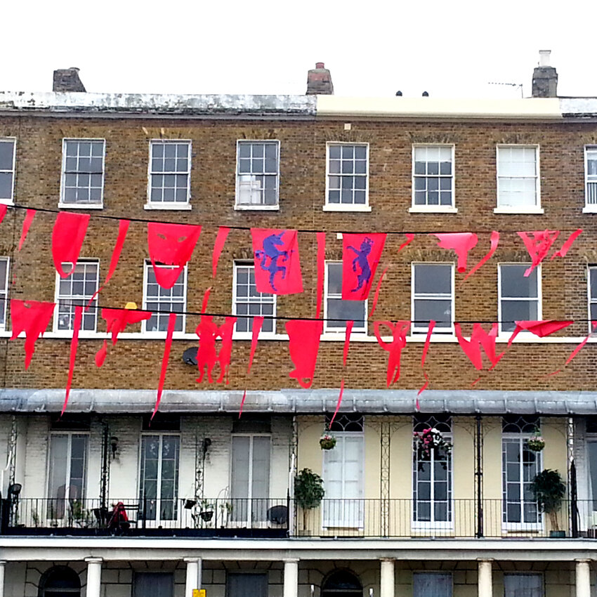 The British and allied side with red bunting.