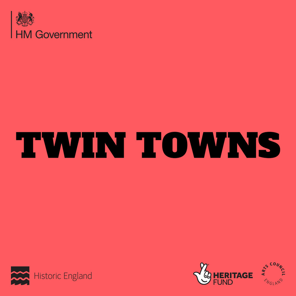 The official logo for the 'Twin Towns' project, commissioned by Historic England