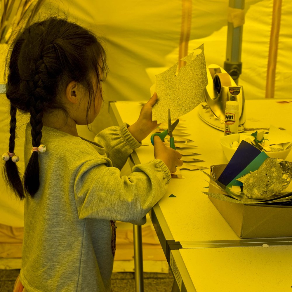 little girl in workshop.jpg