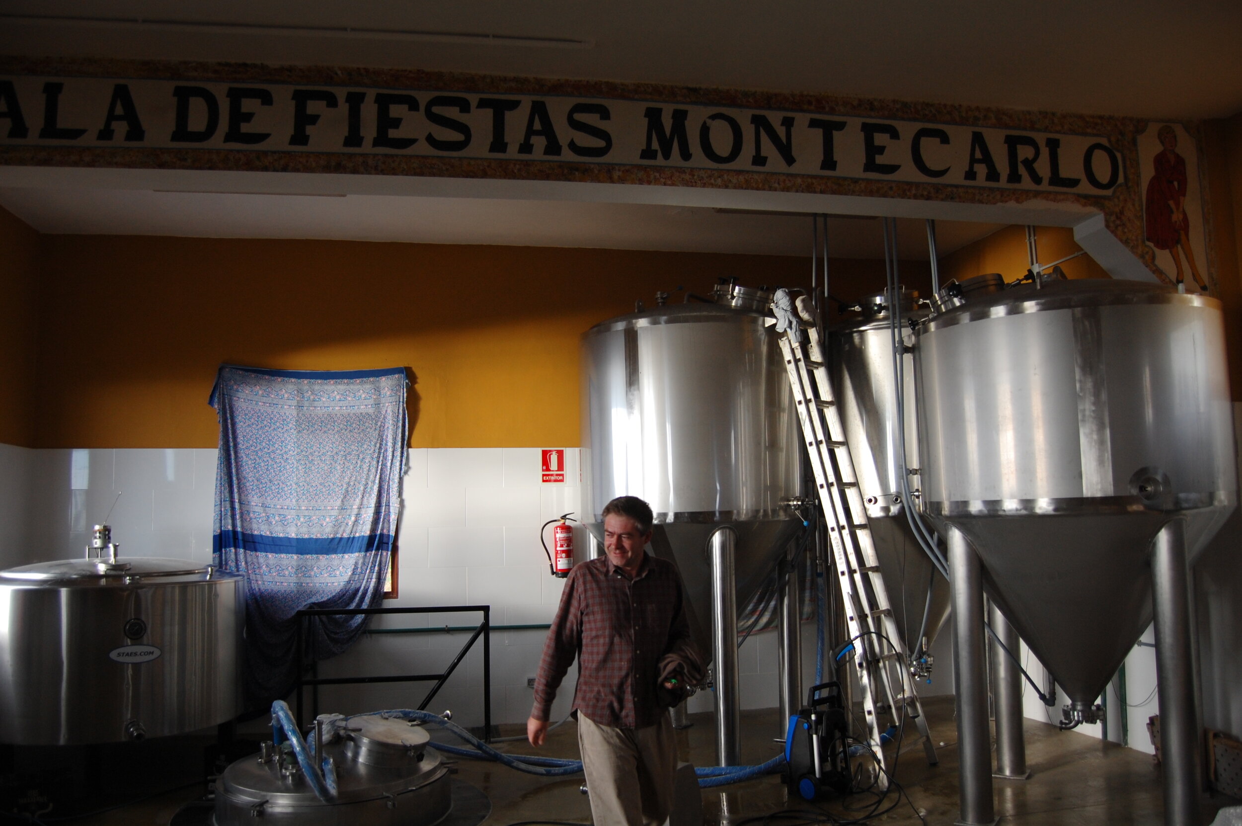 Gino happy at first brew in his cerveceria