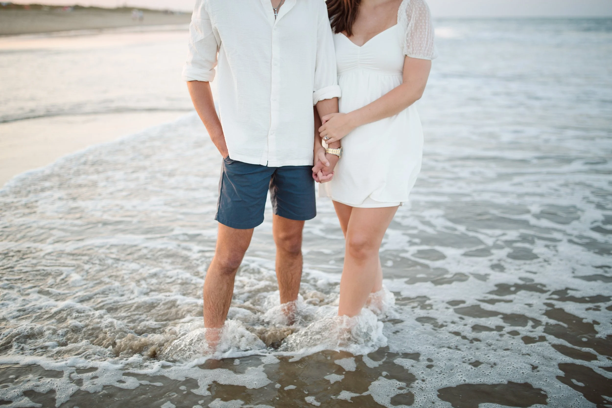 Romantic Golden Hour Pregnancy Announcement at Virginia Beach Oceanfront