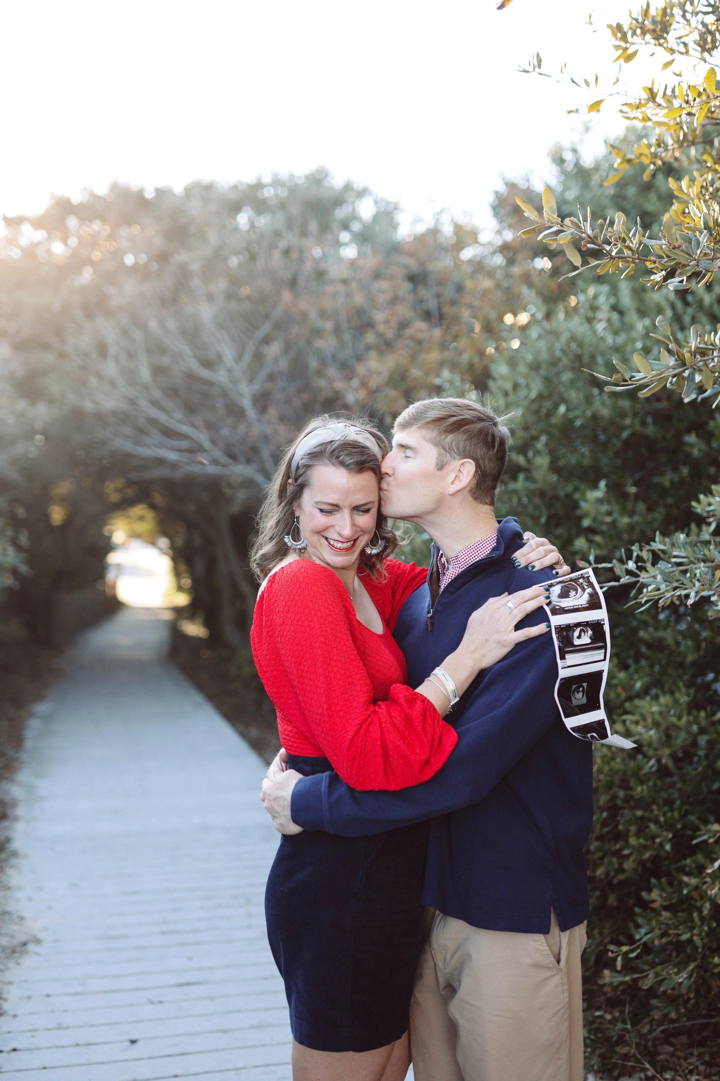 Virginia Beach couple holds ultrasound images