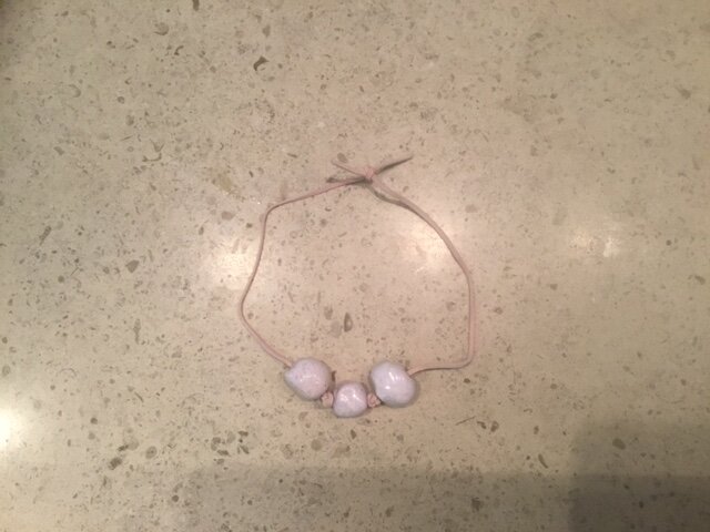 Light Pink round beads on Suede