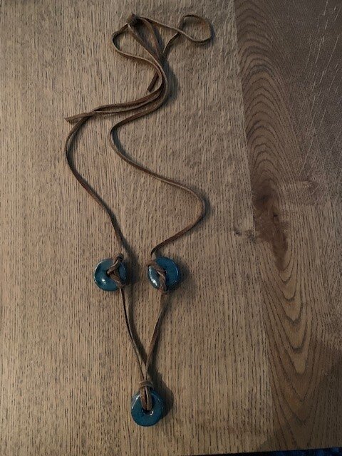 3 Flat Round Tourquoise Beads on Leather