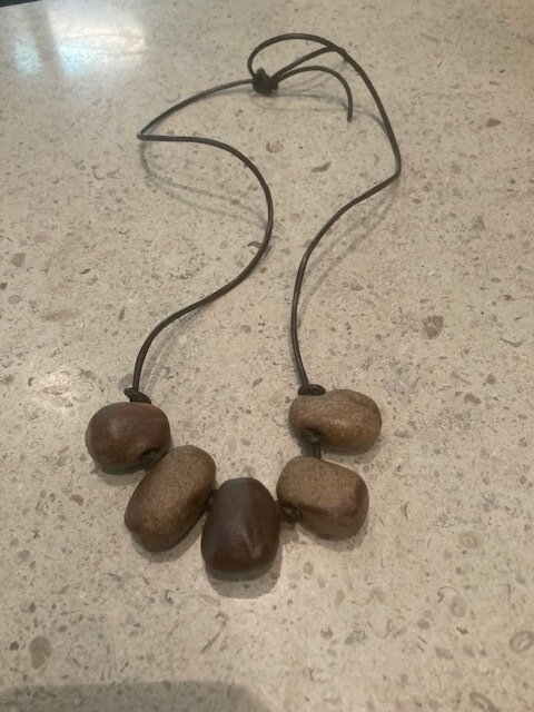 5 Matte Brown/Tan Beads on Brown Leater