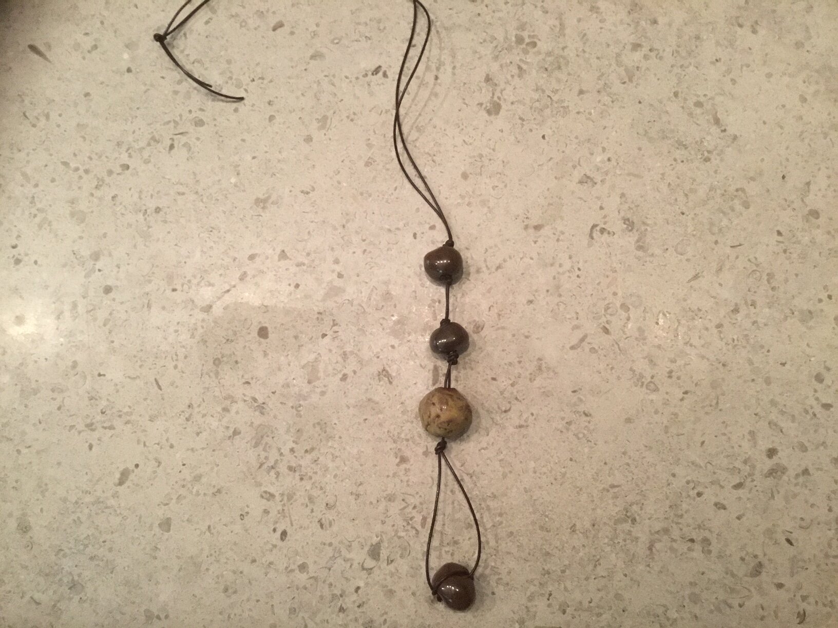 Brown &amp; Tan Hand Fired Beads on Brown Leather