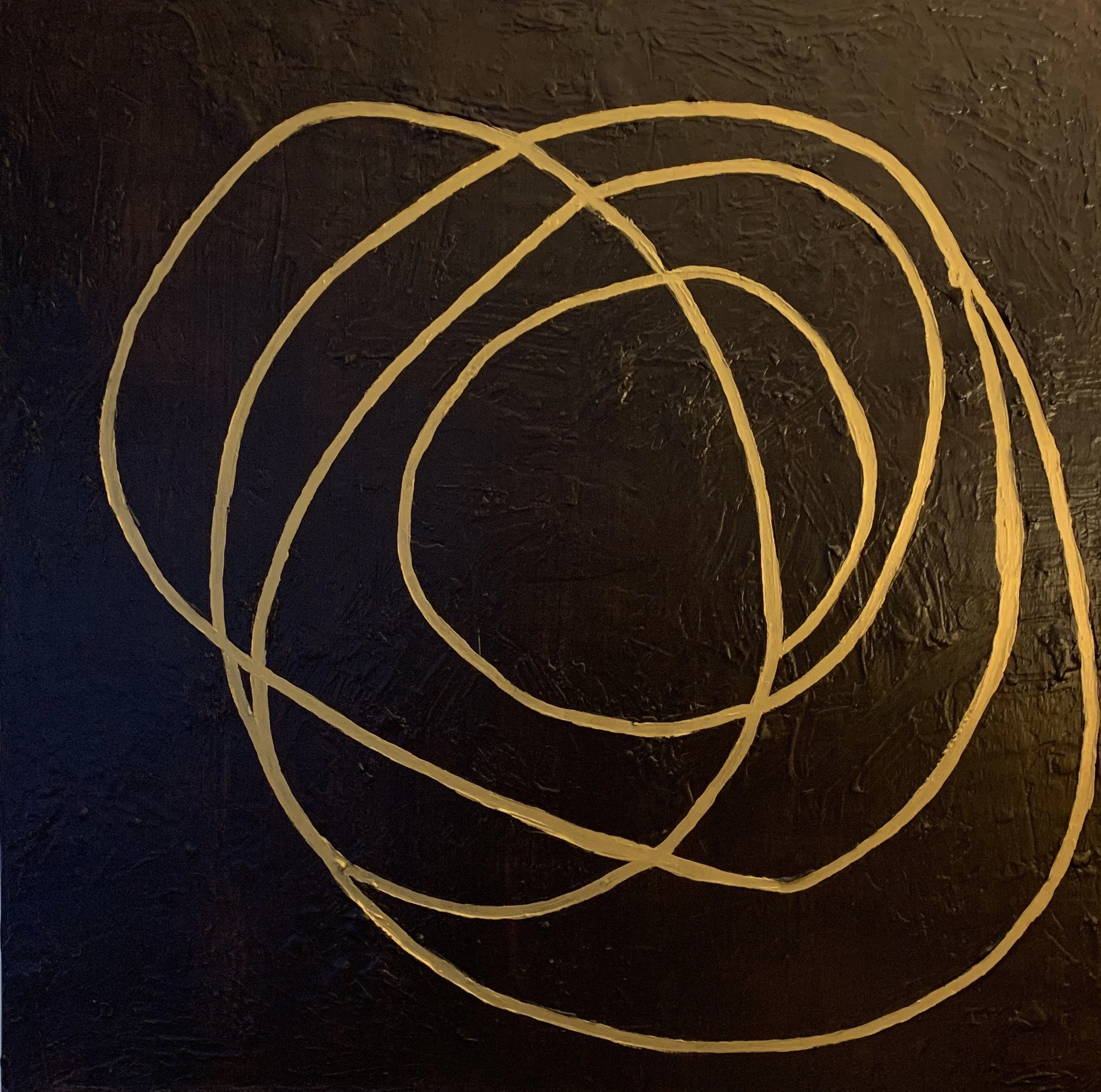 Brown with gold interlocking.jpg