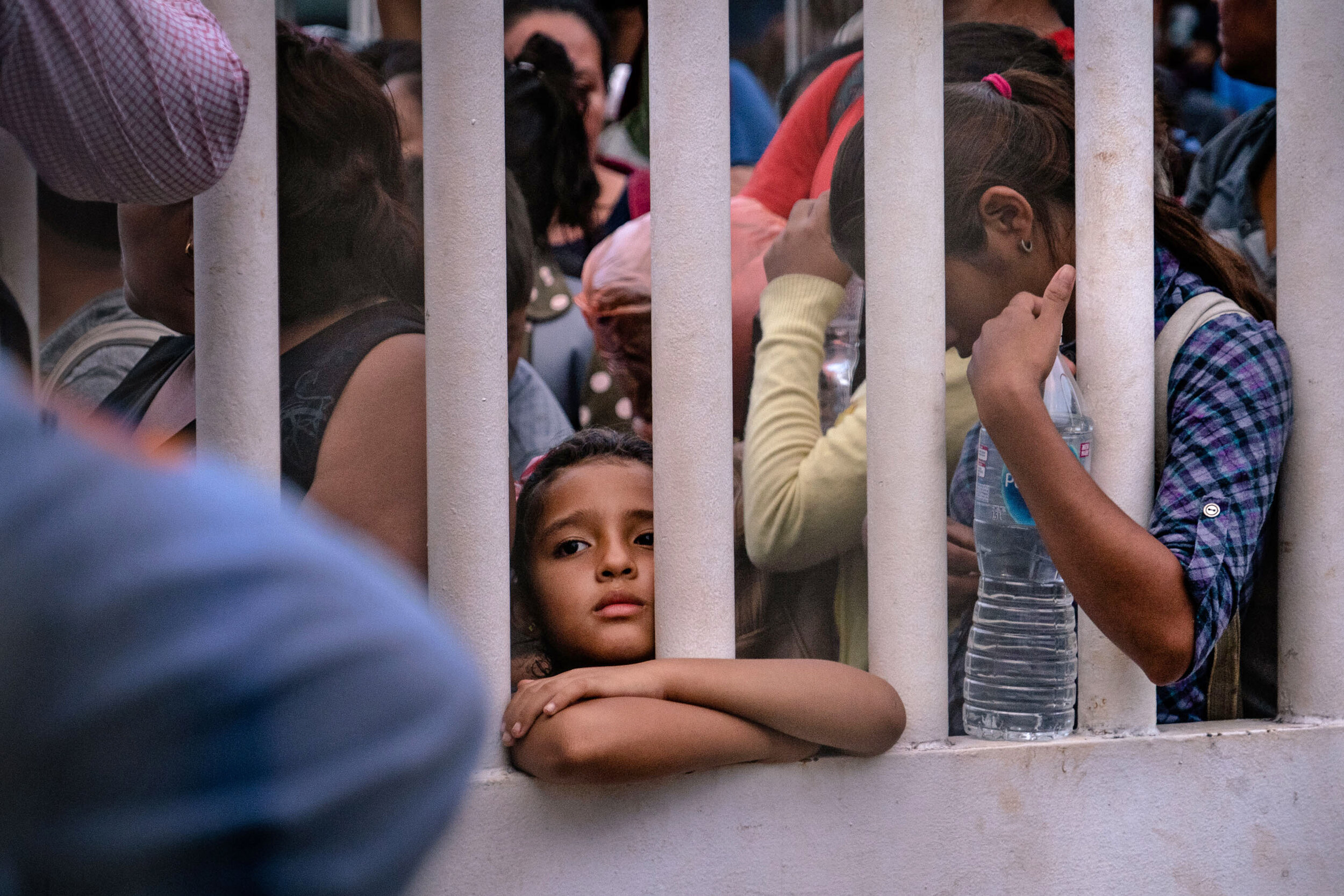  A member of the migrant caravan waits at the Mexico-Guatemala border as authorities decide whether to let the caravan pass northwards.    January, 2020 