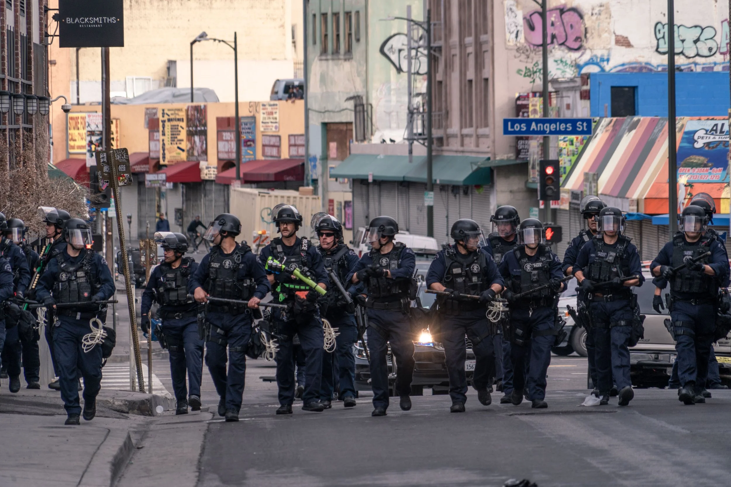  LAPD advance on a group of protestors before arresting them for violation of curfew. June 2020 
