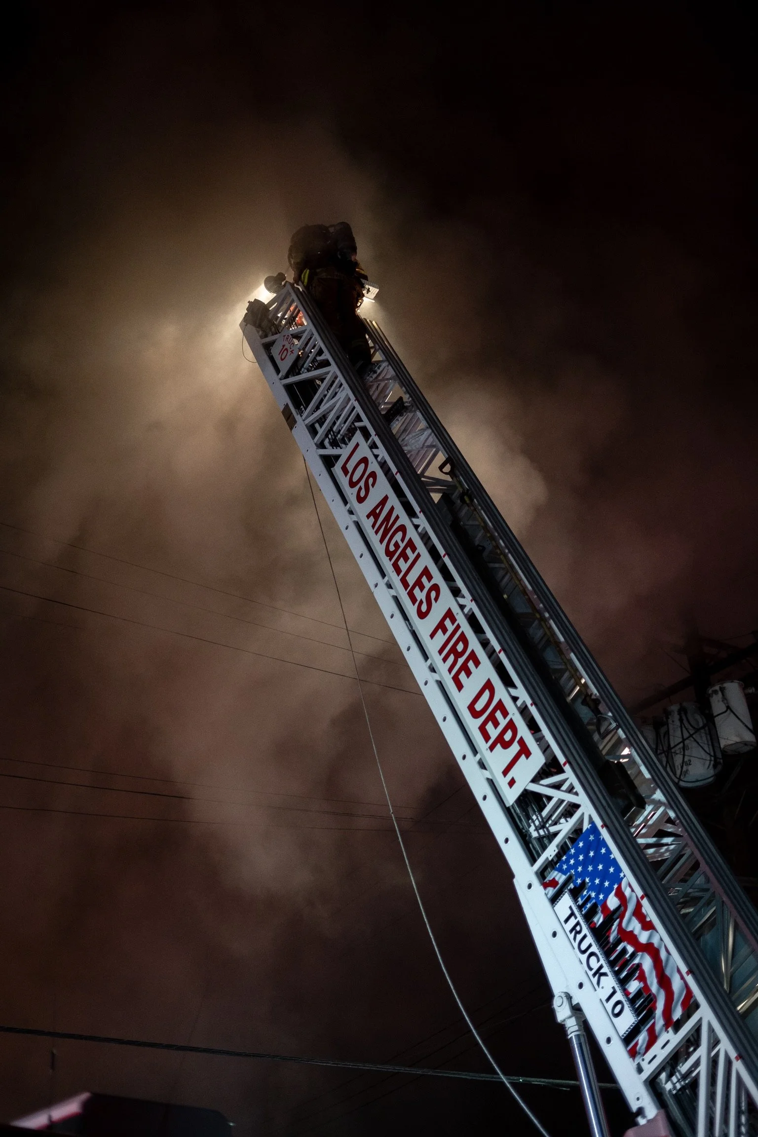  Members of LAFD battle a structure fire in Downtown Los Angeles.   