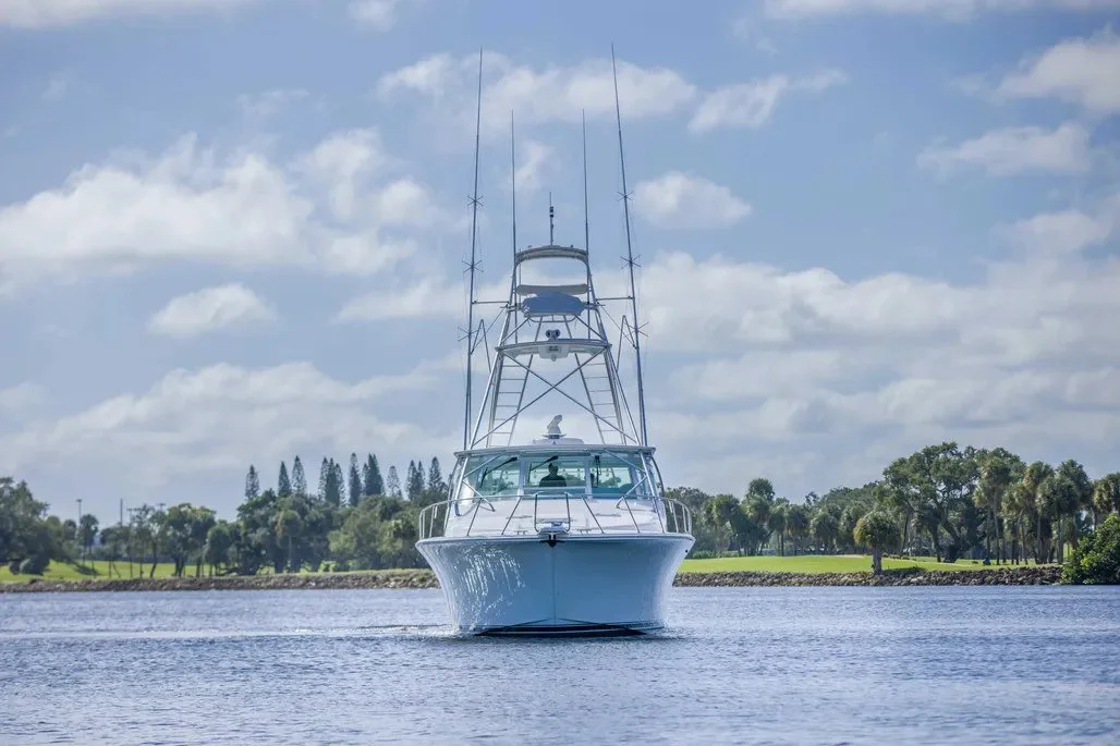 The Cabo 52 Express head on, tower and outriggers rigged