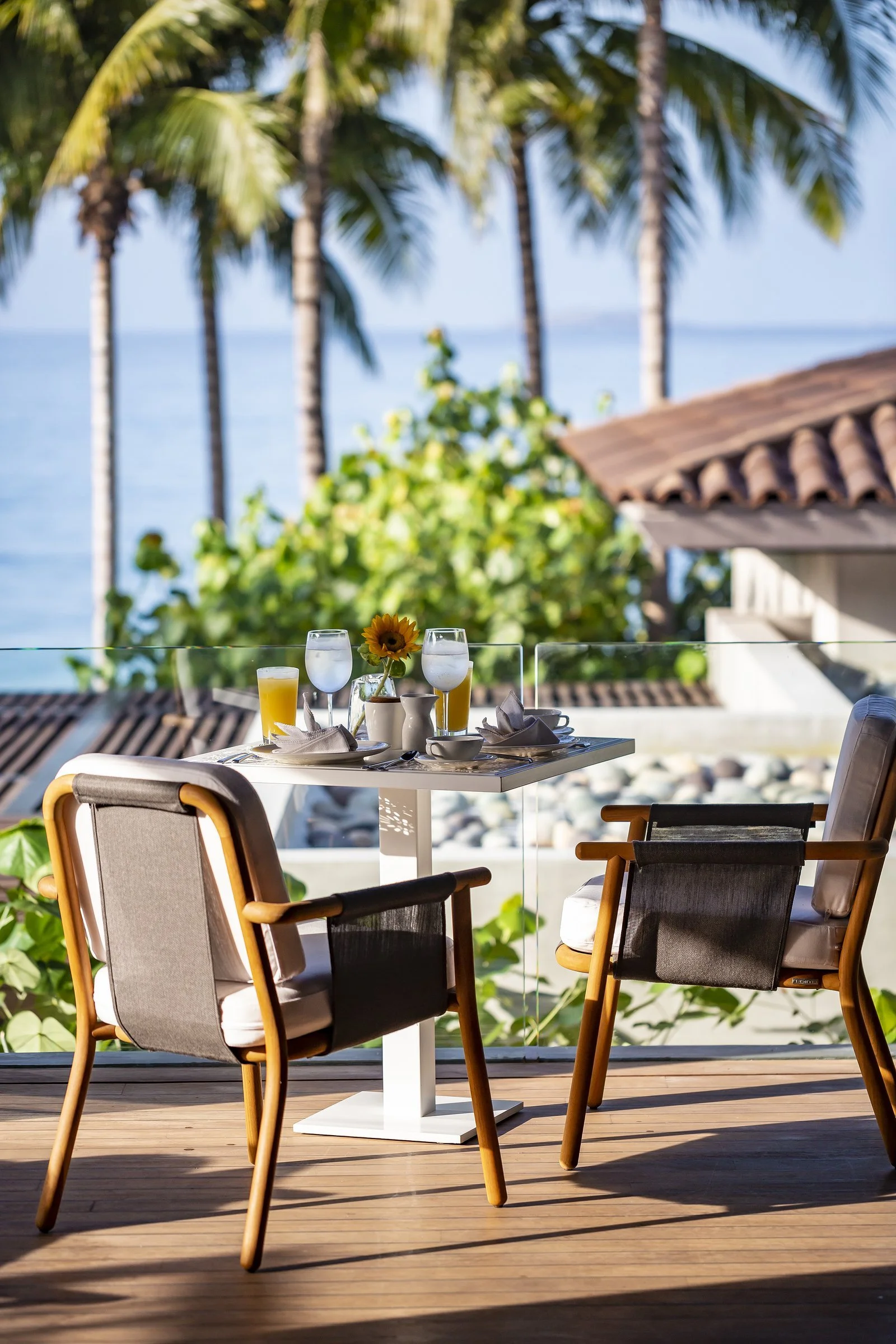 Breakfast for two on a private balcony above the bay