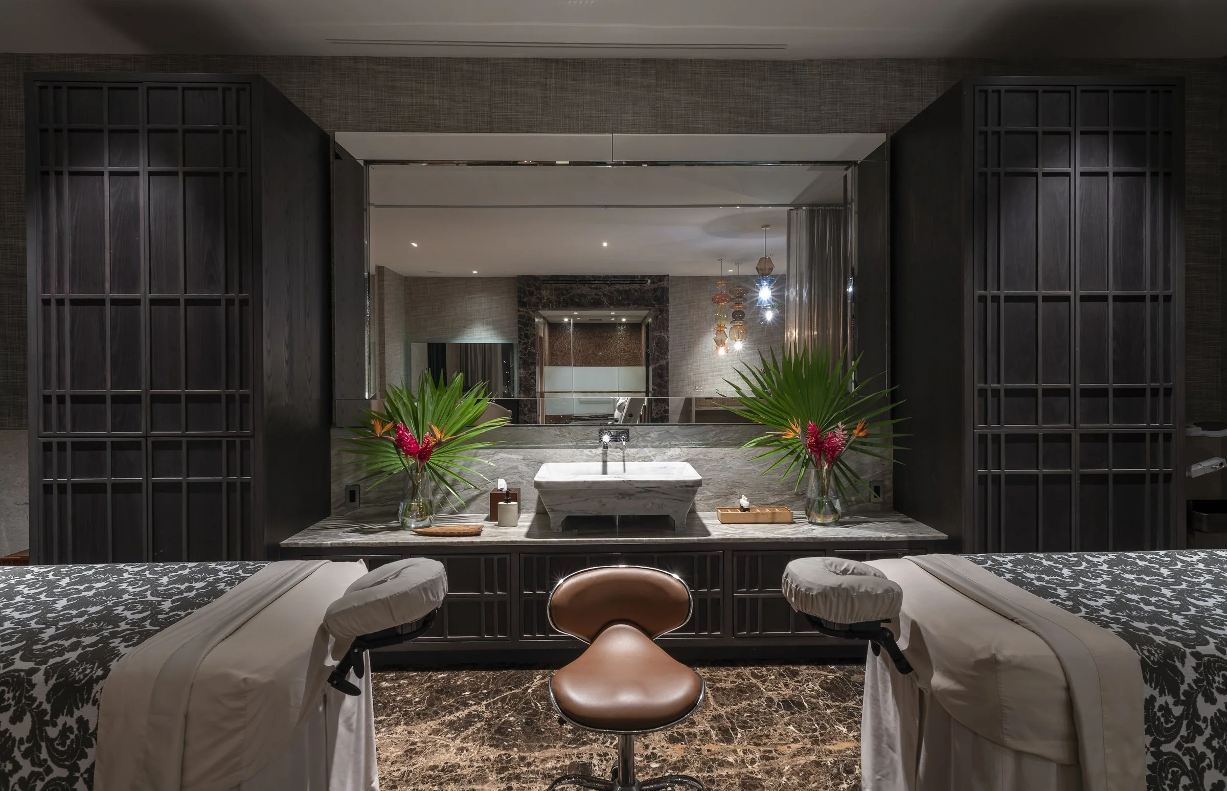 The spa treatment room with twin massage beds