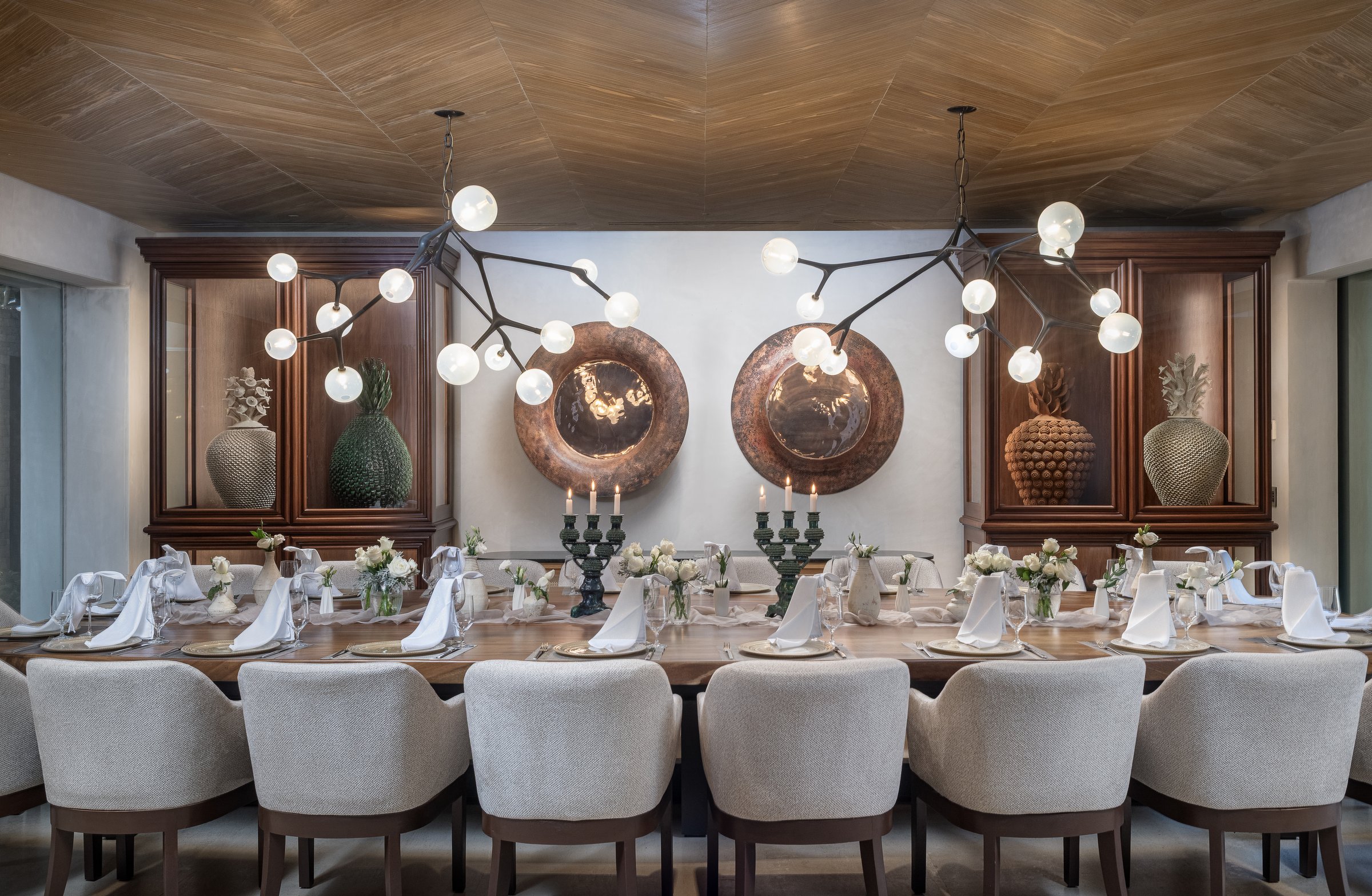 The formal dining room, table set for twenty