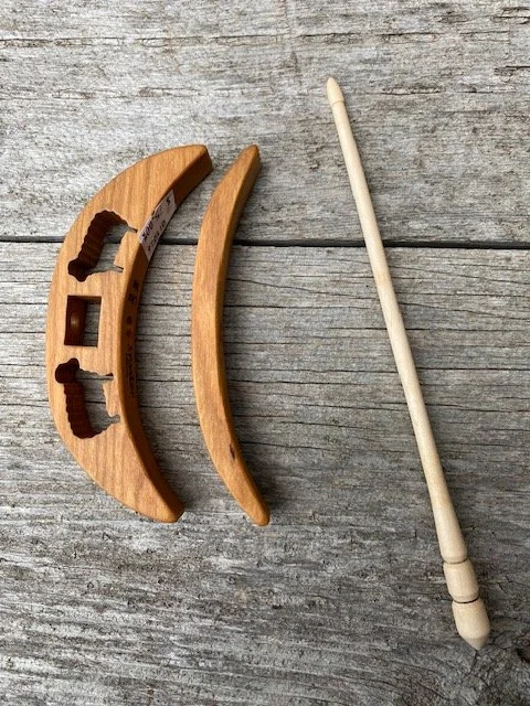 turkish drop spindle with sheep.jpg