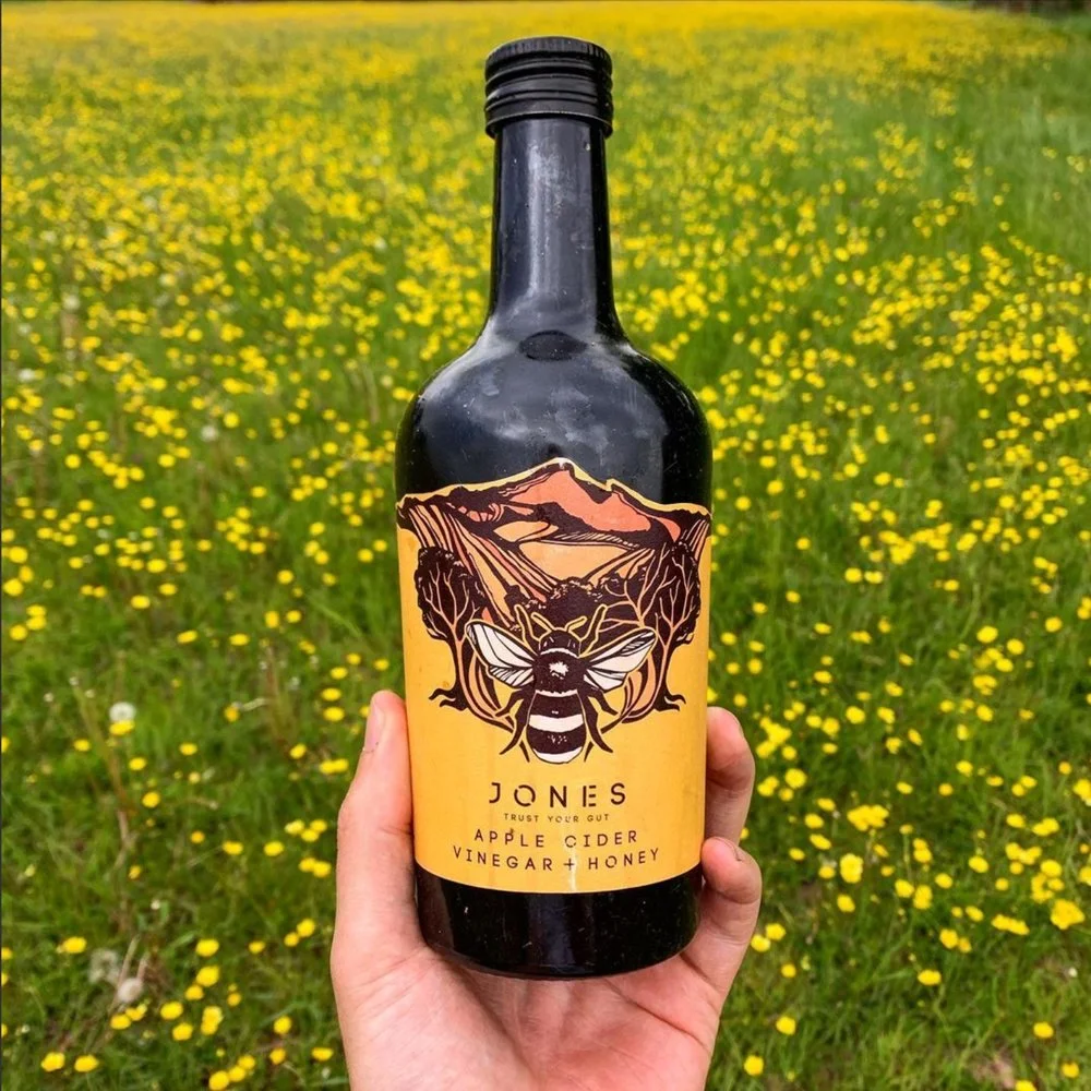 Organic Apple Cider Vinegar With Honey In Field