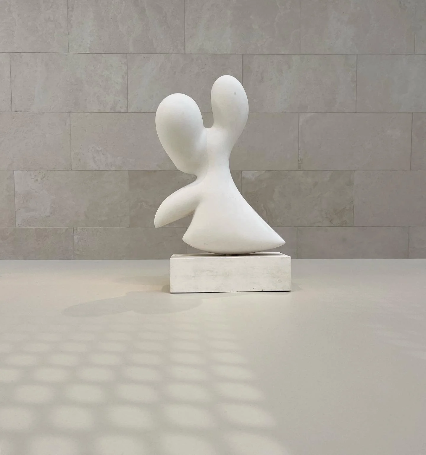 Jean (Hans) Arp's organic form interacting with Renzo Piano's architectural elements: travertine wall and diffused light from cast aluminum oculi sunscreen.

&quot;In a 1960 interview, (Arp) explained his sculptural practice as an intuitive, almost u