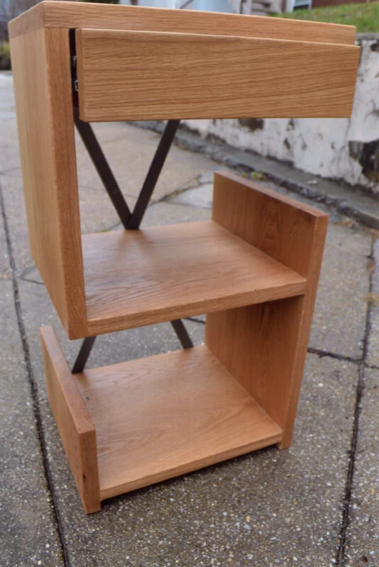  White oak end table with metal crossbars and drawer. 