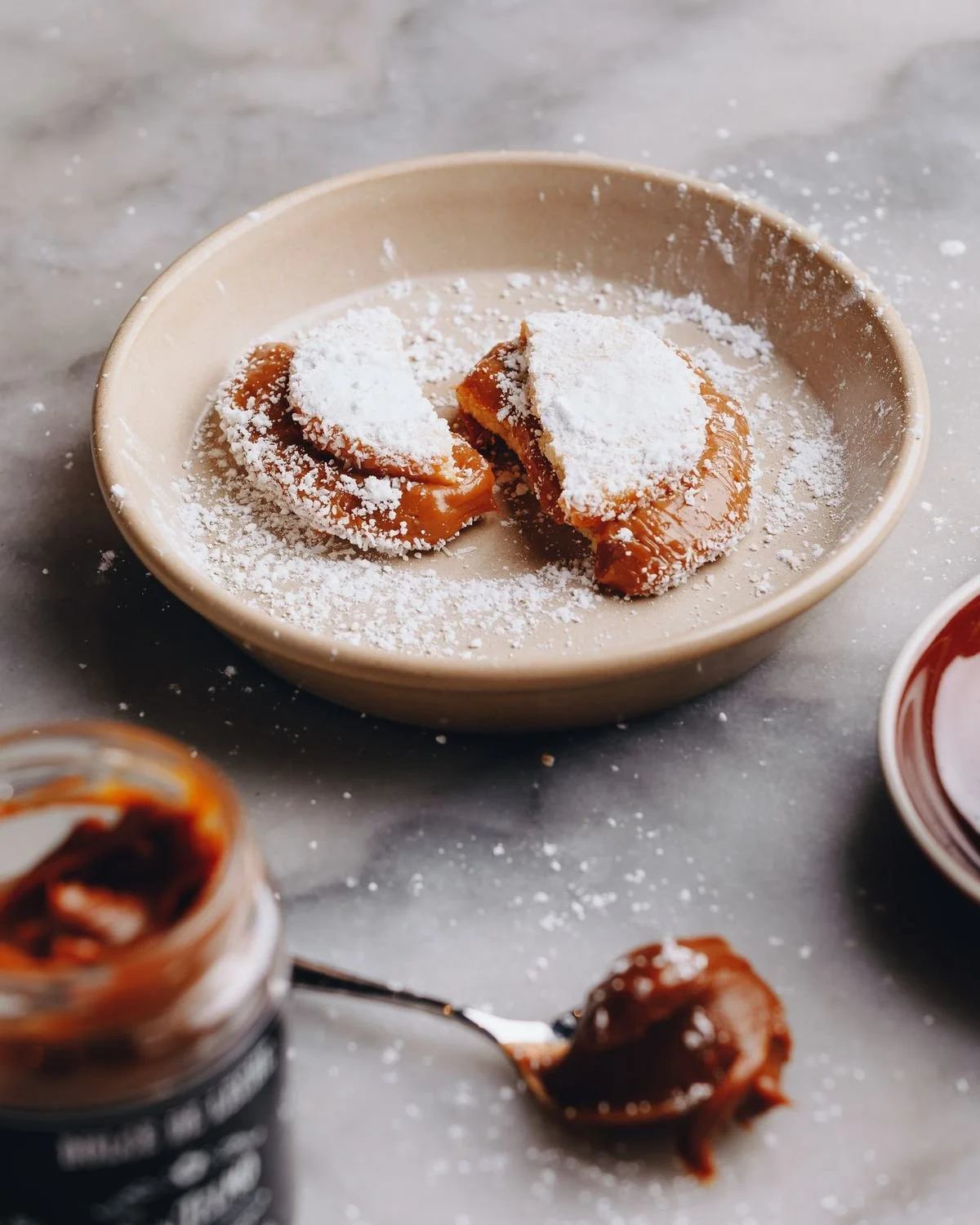 Alfajor and dulce de leche.jpeg