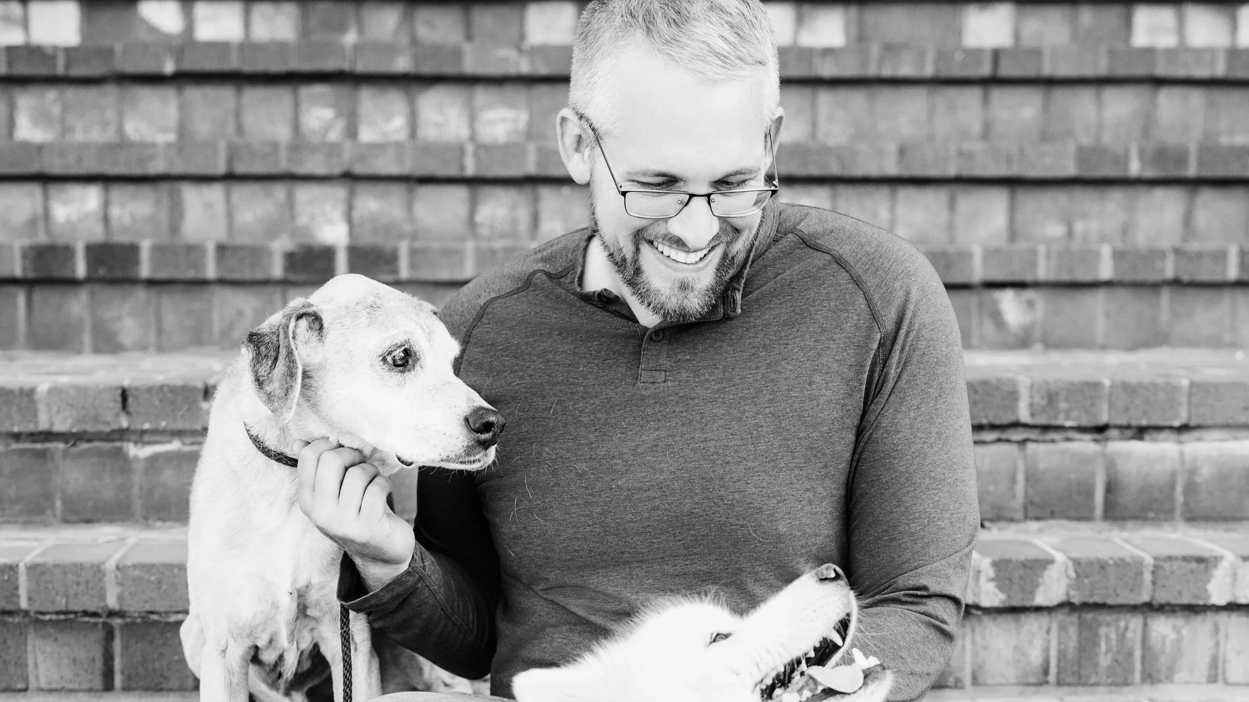 Brant Weller, The Trusted Companion owner with his two dogs