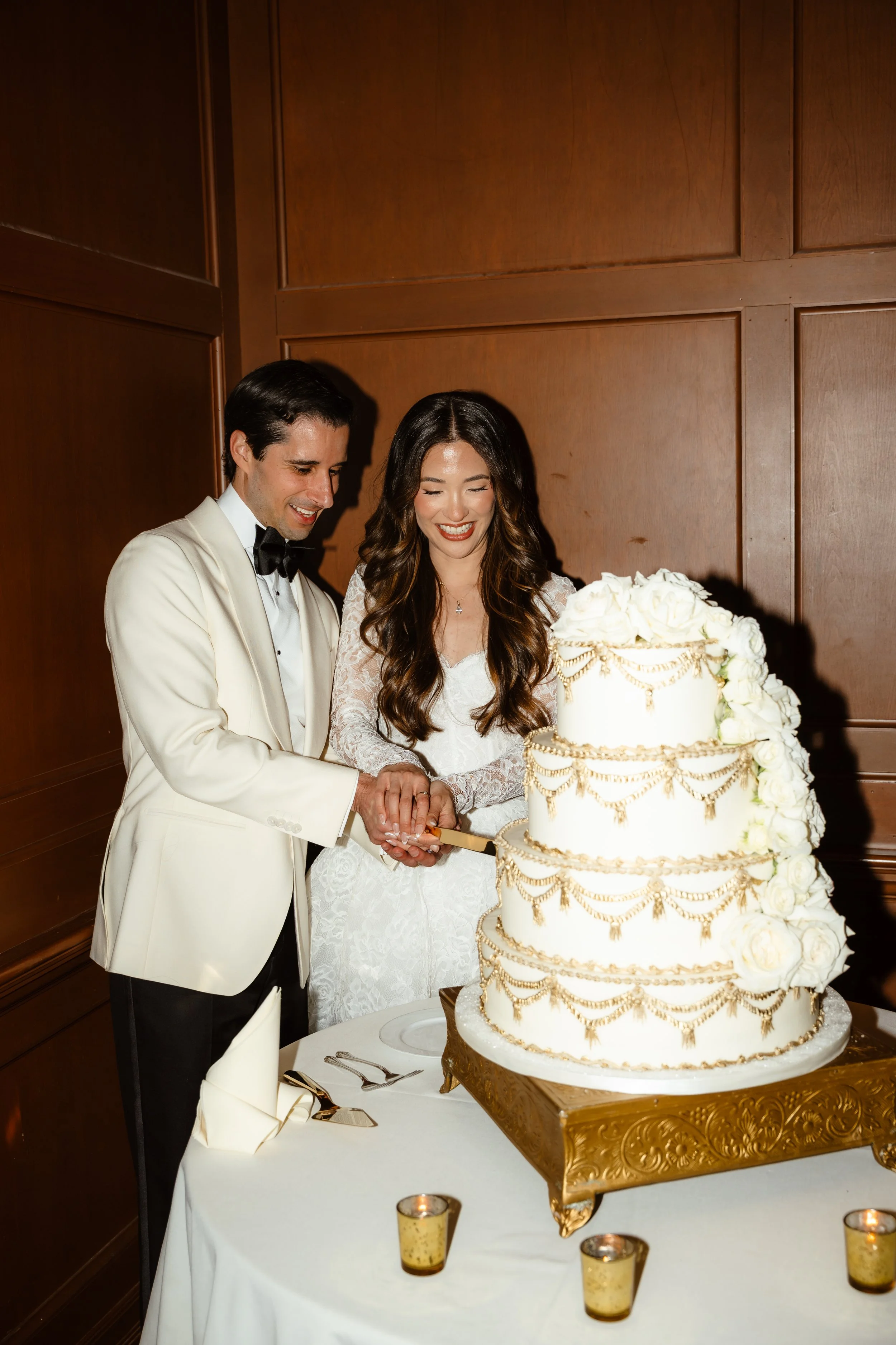 cutting cake at wedding 